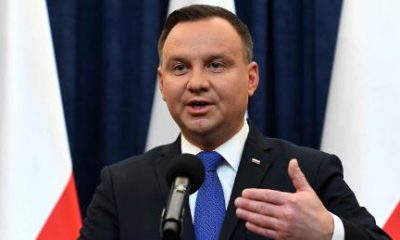 Poland's President Andrzej Duda announces he would sign the controversial Holocaust bill into law.